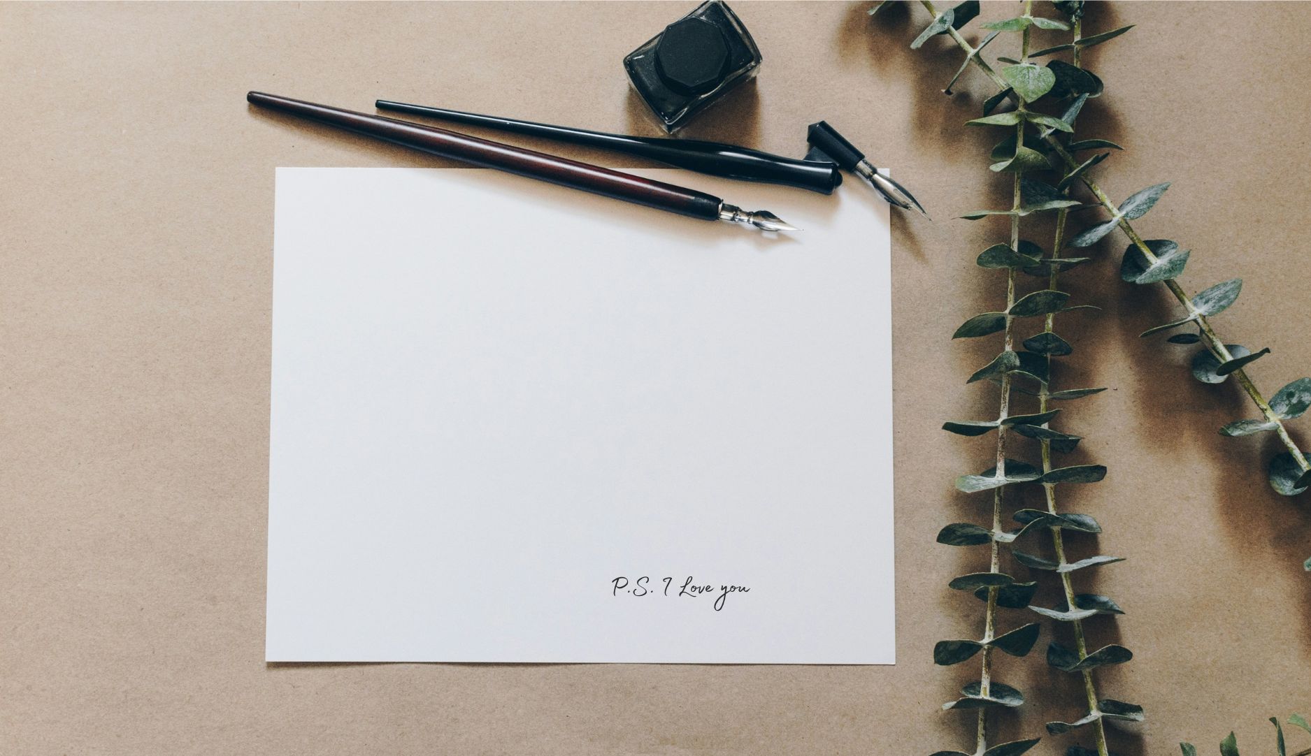 Open notebook with pen, symbolizing the process of recording personal memories and messages
